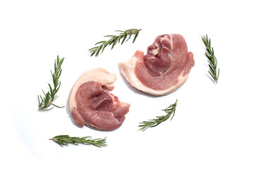 Pork meat with rosemary on white background.