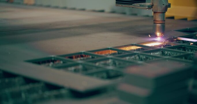 Plasma laser cutting metal sheet with sparks High Temperature