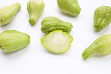 Fresh chayote fruit on white background.