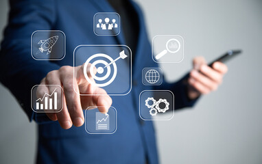 Targeting the business concept, target with digital marketing icons on virtual screen internet...