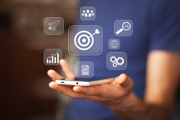 Targeting the business concept, target with digital marketing icons on virtual screen internet network connection, Business goal
