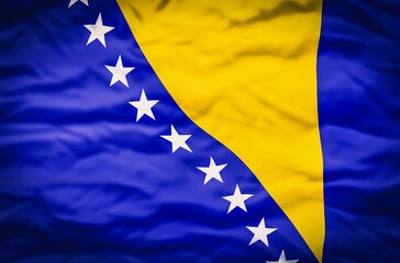 Bosnia and Herzegovina flag on fabric wavy background. Wavy flag of Bosnia and Herzegovina fills the frame. - 601210122