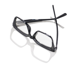 Stylish black eyeglasses on white background