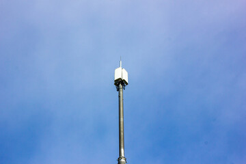 Fototapeta na wymiar Cell tower against the sky. Base station. Radio tower.