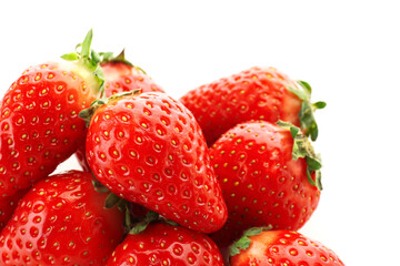 Heap of fresh strawberries on white background