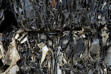 Pile of compact texture of plastic waste for recycling in the sorting company.