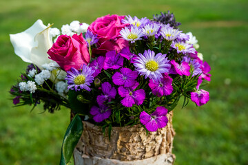 Close up of a beautiful bouquet of pink and purple flowers.