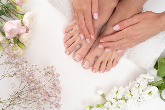 Perfect female feet with flowers.