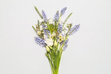 Beautiful bouquet with different flowers on grey background