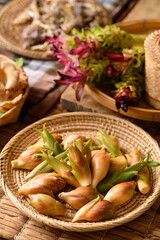Natural fresh edible flower are an ingredient in local thai cuisine on black background