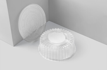 Blank plastic round packaging with transparent lid for baking, pastry and cakes isolated on white background. 3D illustration, 3D rendering.
