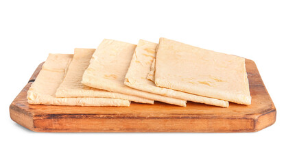 Wooden board with fresh thin lavash on white background