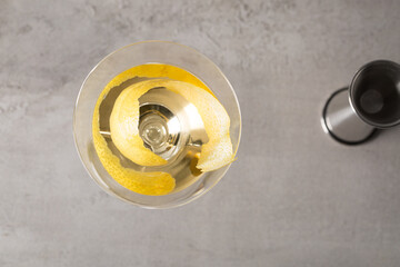 Martini Cocktail boozy gin, Italian vermouth, orange bitters and a twist of lemon peel