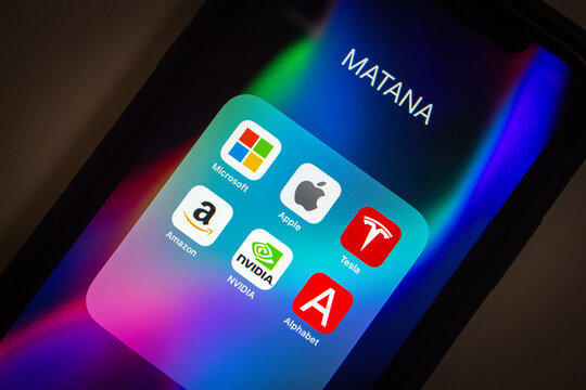 Vancouver, CANADA - May 7 2023 : MATANA (Microsoft, Apple, Tesla, Alphabet Inc, Nvidia, and Amazon) icons seen in an iPhone. An undated version of FAANG, GAFA or MAMAA. New big tech companies concept