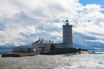 Tolbukhin island lighthouse, Saint-Petersburg, Kronstadt, Gulf of Finland view, Russia in a summer sunny day, lighthouses of Russia travel