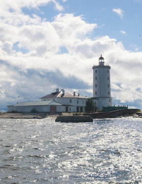 Tolbukhin island lighthouse, Saint-Petersburg, Kronstadt, Gulf of Finland view, Russia in a summer sunny day, lighthouses of Russia travel