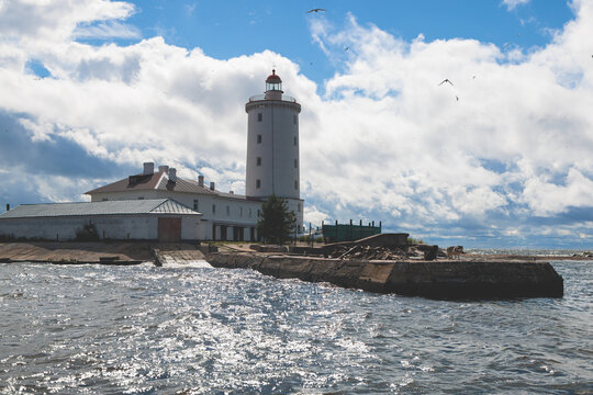 Tolbukhin island lighthouse, Saint-Petersburg, Kronstadt, Gulf of Finland view, Russia in a summer sunny day, lighthouses of Russia travel