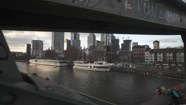 Main River and city skyline from Eiserner Steg footbridge at golden hour, Frankfurt am Main, Hesse