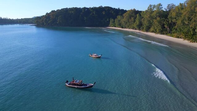longtailboot overflight flyover drone
Nice aerial top view flight 
ko kut boat in bay lagoon beach, Thailand summer 2022. 4k uhd cinematic footage.