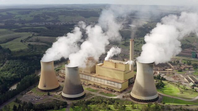 Coal-fired power station in Yallourn, LaTrobe Valley, Victoria, Australia, aerial establishing shot of historical thermal generator, legacy electricity infrastructure, and fossil-fuels pollution.