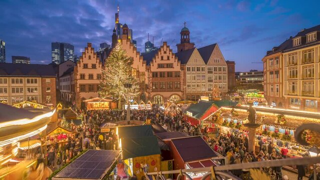 Christmas Market and carousel from elevated position in Romerberg Square at dusk, Frankfurt am Main, Hesse
