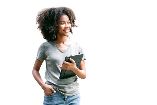 Image Of Young African Woman, Company Worker In Casual Wear, Smiling And Holding Digital Tablet, Standing Over White Background