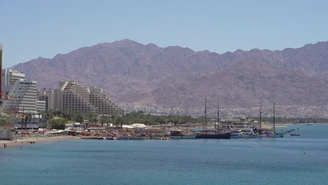 Northern Marina Facing The Red Sea With Jordan Mountains In the Background - Static Wide