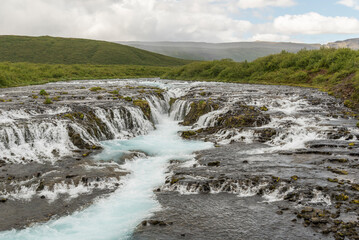 Summer view on Bruarfoss waterfall in the south of Iceland. Hike, trail, hiking, powerful, clear, pure, unpolluted, magical, wonderful, icelandic rivers, long exposure