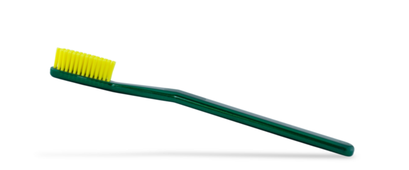 Photo of a green toothbrush isolated on a white background.