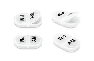 Empty daily pillbox for medications and nutritional supplements isolated on a white background.