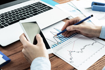 Business woman works at a desk in the office