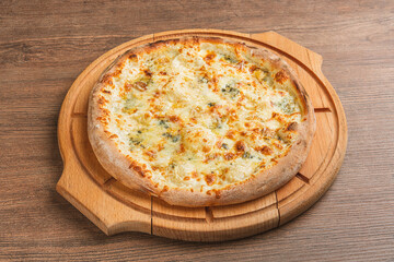 Fresh classic pizza with tomato sauce, mozzarella, spicy chorizo, bell pepper on a wooden background