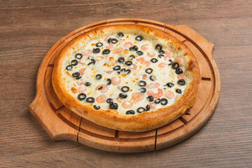 Fresh classic pizza with tomato sauce, mozzarella, spicy chorizo, bell pepper on a wooden background