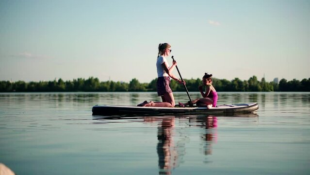 Water tourism on standup paddle board . sup floating	