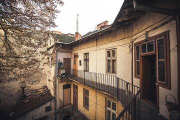 Old, crumbling courtyard of the old district of Lviv Ukraine. Image for your creative design or illustrations about ruin.