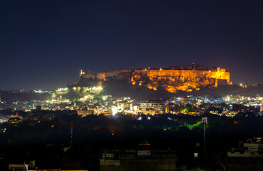 mehrangarh fort with city night landscape view with lights at night