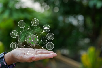 Technology, hand holding with environment Icons over the Network connection on green background.