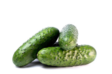 Ripe fresh green cucumbers isolated on a white background