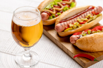 Various hot dog and beer