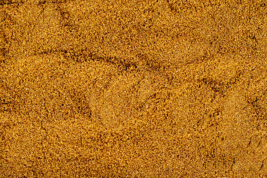 Pile of cumin powder as background, spice or seasoning as background. Ground or sifted garam masala. Cumin powder. Indian spice
