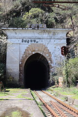 entrance arch of the old abandoned railway tunnel in Gagra, Abkhazia