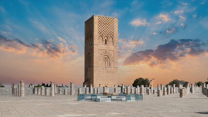 Rabat, Morocco - September 2022: Hassan tower at Mausoleum of Mohammed V, built to honor the memory of the late King Mohammed V during sunset.