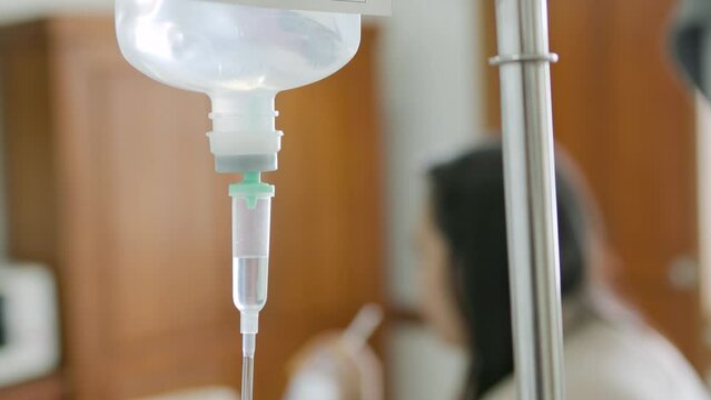 Giving saline in the hospital, saline drip, saline tube