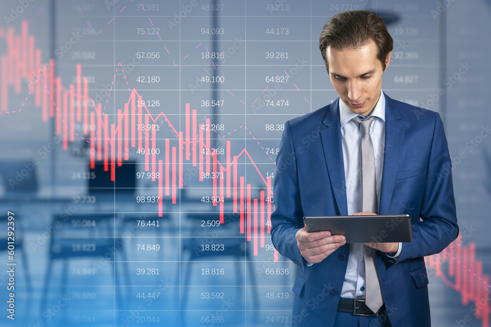 Poster attractive thoughtful european businessman using tablet with falling red business graph grid on blur