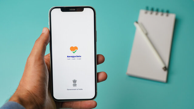 Aarogya Setu Mobile Phone App On Colour Background: Kolkata, India - May 11 2023
