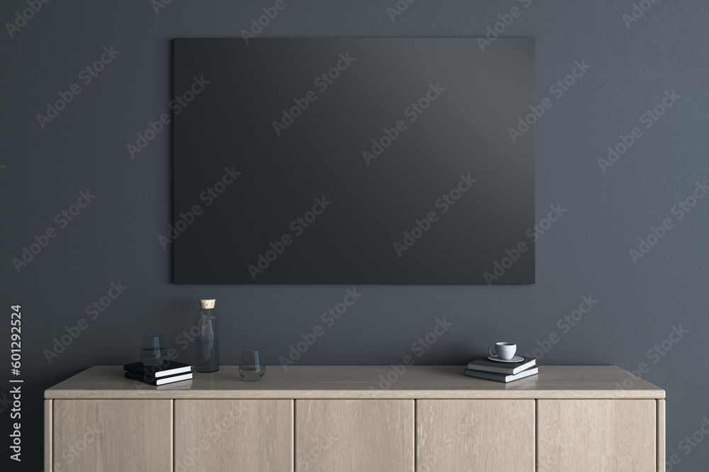Poster modern wooden tv shelf with items and empty black mock up frame on dark wall background. interior de