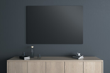 Modern wooden TV shelf with items and empty black mock up frame on dark wall background. Interior design and living room with place for advertisement concept. 3D Rendering.