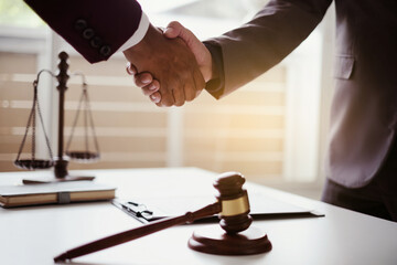 Lawyer office. Businessman and lawyer discuss the contract document. Treaty of the law. Sign a contract business.