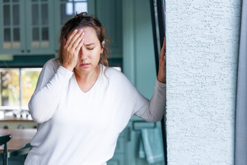 Young woman suffering from vertigo or dizziness problem of brain or inner ear