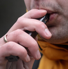 Man smoking an electronic cigarette